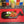YAKISUGI WHALE STYLE ASH SERVING BOARD displayed with Caprese salad in a kitchen setting