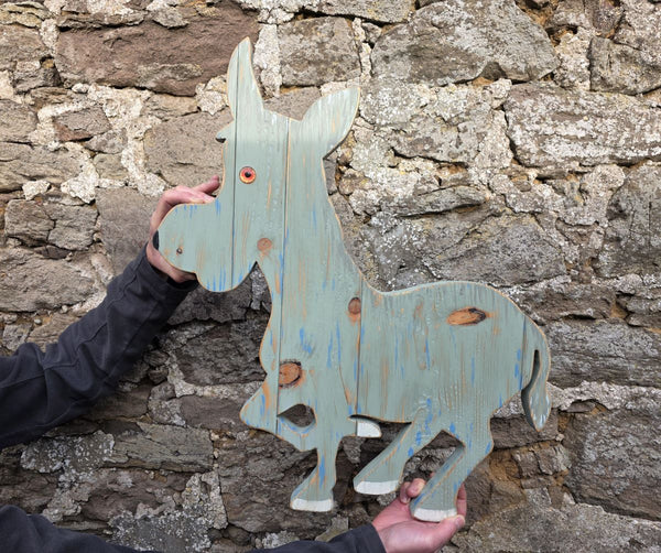 wooden donkey wall art - being held for sizing