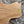 close up of Stalking cat's face wooden wall art viewed at an angle