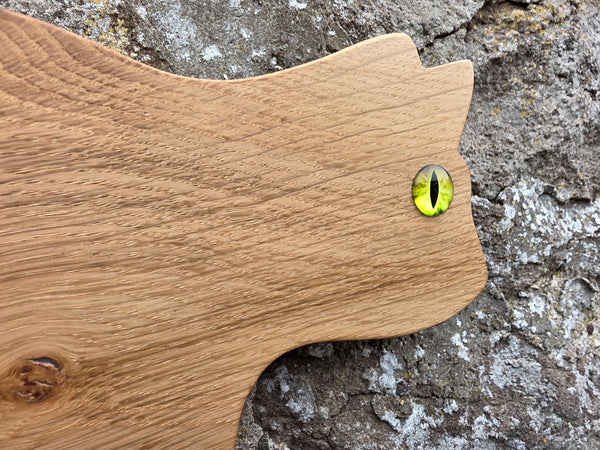 close up of Stalking cat's face wooden wall art viewed at an angle