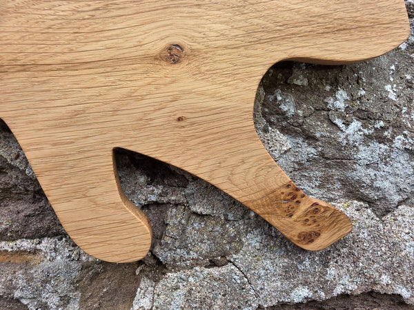 Stalking cat wooden wall art close up of front paws