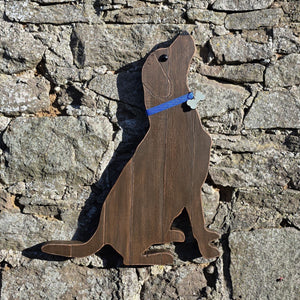 Wooden Labrador Retriever  wall art against a stone wall