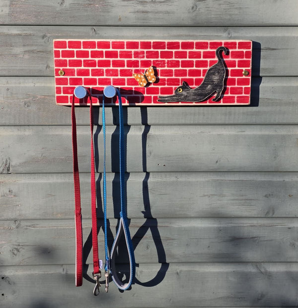 WALL ART HANGER FOR CAT LEADS