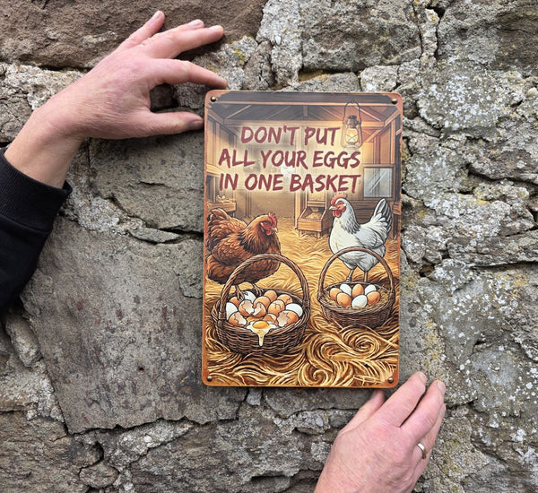 VINTAGE STYLE METAL SIGN (REPRODUCTION) DON'T PUT ALL YOUR EGGS IN ONE BASKET