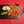 YAKISUGI WHALE STYLE ASH SERVING BOARD displayed with Capresse salad in a kitchen setting