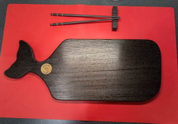 YAKISUGI WHALE STYLE ASH SERVING BOARD showing the underside with Oak and Still company logo & displayed a pair of Chopsticks & Yakisugi oak chopstick rest