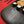 YAKISUGI WHALE STYLE ASH SERVING BOARD showing a close up view of the glass eye & woodgrain