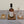 WHISKY DISPLAY PLINTH with A PAIR OF OAK COASTERS