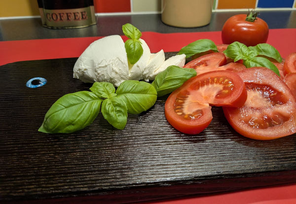 YAKISUGI WHALE STYLE ASH SERVING BOARD close up view with salad on the board