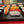 YAKISUGI WHALE STYLE ASH SERVING BOARD displaying a selection of sushi