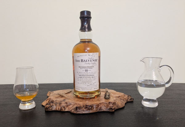 'SCOTCH ON THE ROCKS' OAK BURR DISPLAY PLINTH - TRUE TO NATURE