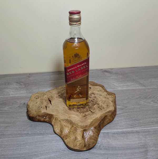 oak burr cat's paw display plinth with whisky bottle