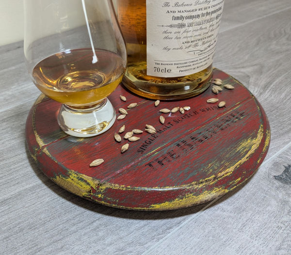 decorative oak barrel lid display plinth with whisky glass and bottle