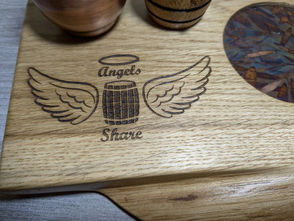 angels share graphic on oak display plinth