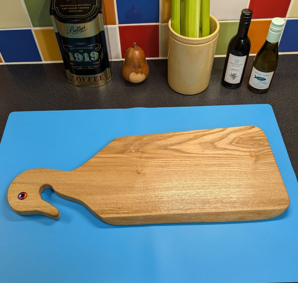 live-edge ash duck style charcuterie/serving board