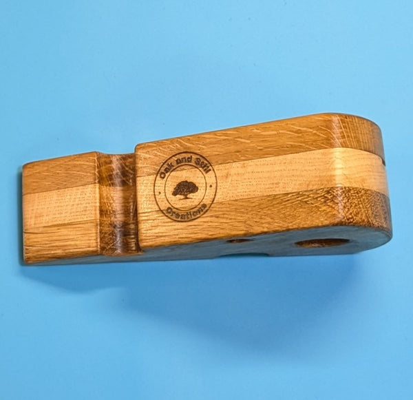 under side of oak cheese wedge knife block and cheese knife