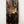 Douglas Fir & flame painted copper maple leaf wall art display piece hanging on a wall close up view