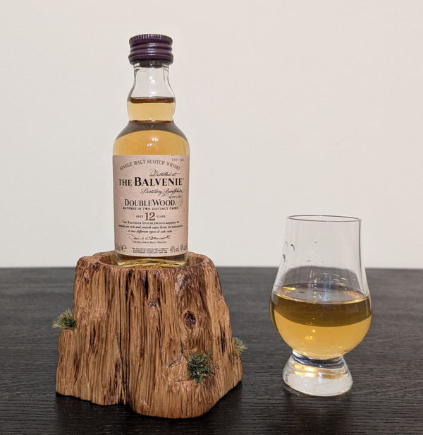 'SCOTCH ON THE ROCKS' OAK DISPLAY PLINTH WITH COPPER FLAME-PAINTED INSERT
