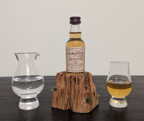 'SCOTCH ON THE ROCKS' OAK DISPLAY PLINTH WITH COPPER FLAME-PAINTED INSERT