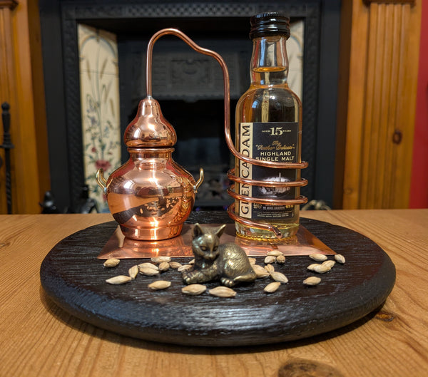 YAKISUGI 'BARREL LID STYLE' DISPLAY PLINTH WITH MINIATURE BOTTLE HOLDER DECORATIVE COPPER STILL