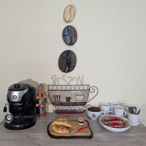 Coffee Bean Wall Art (Set of 3) including a Gold coffee bean - Douglas Fir wood Yakisugi Style displayed on wall in Coffee Shop setting