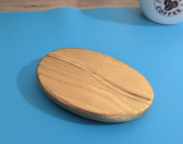 Gold coffee bean (small size) wall art decor up close showing Yakisugi style Ash wood 
