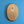 Gold coffee bean (small size) wall art decor up close showing Yakisugi style Ash wood reverse side with wall fixing bracket and Oak and Still Creations company logo 