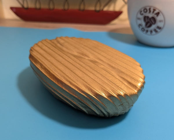 Gold coffee bean (small size) wall art decor up close showing Yakisugi style Douglas Fir wood 