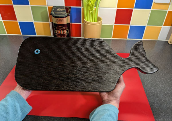 YAKISUGI WHALE STYLE ASH SERVING BOARD being held for sizing