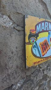 Vintage style Marmite sign on a stone
 wall video clip