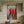 AI GENERATED VIDEO CLIP SHOWING A FUN VERSION OF VINTAGE STYLE METAL SIGN WITH THREE CHILLIS ON IT WHICH COMBUST INTO FLAMES WITH THE WORDS HOT, HOT, HOT