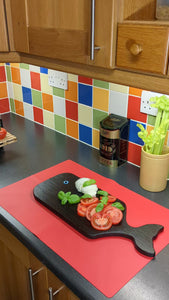 Mini forklift delivering a tomato to Ash wood Yakisugi Whale style serving board video clip