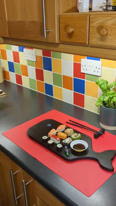 Mini forklift delivering sushi to Whale style Ash Yakisugi Serving Board in a kitchen setting video clip